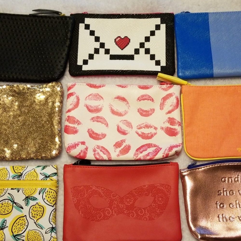 Bundle of 9 adorable make up bags!